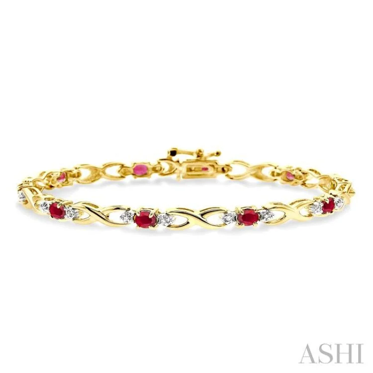 4x3mm Oval Cut Ruby and 1/10 Ctw Single Cut Diamond Bracelet in 14K Yellow Gold