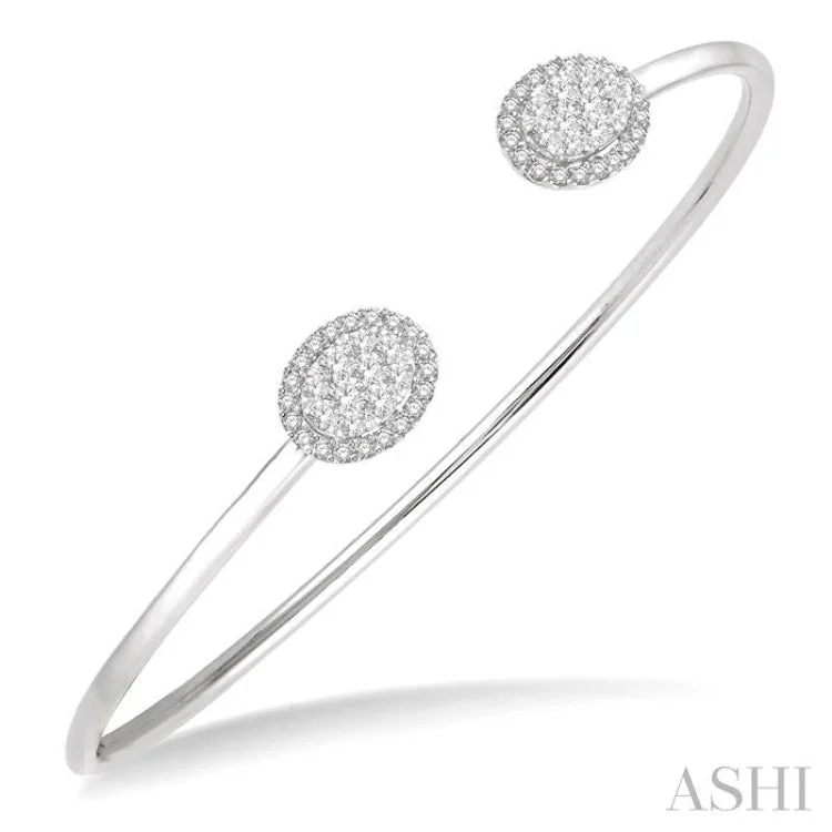 5/8 Ctw Oval Shape Lovebright Open Cuff Diamond Bangle in 14K White Gold